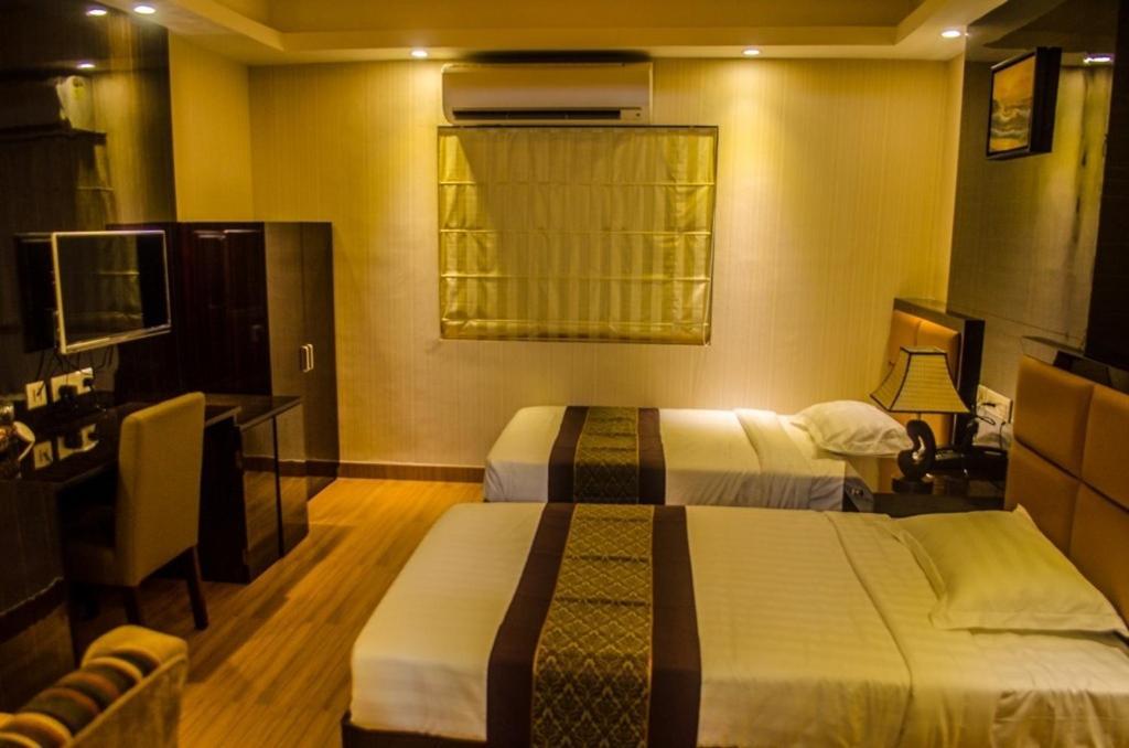 Hotel Comfotel Calcutta Buitenkant foto